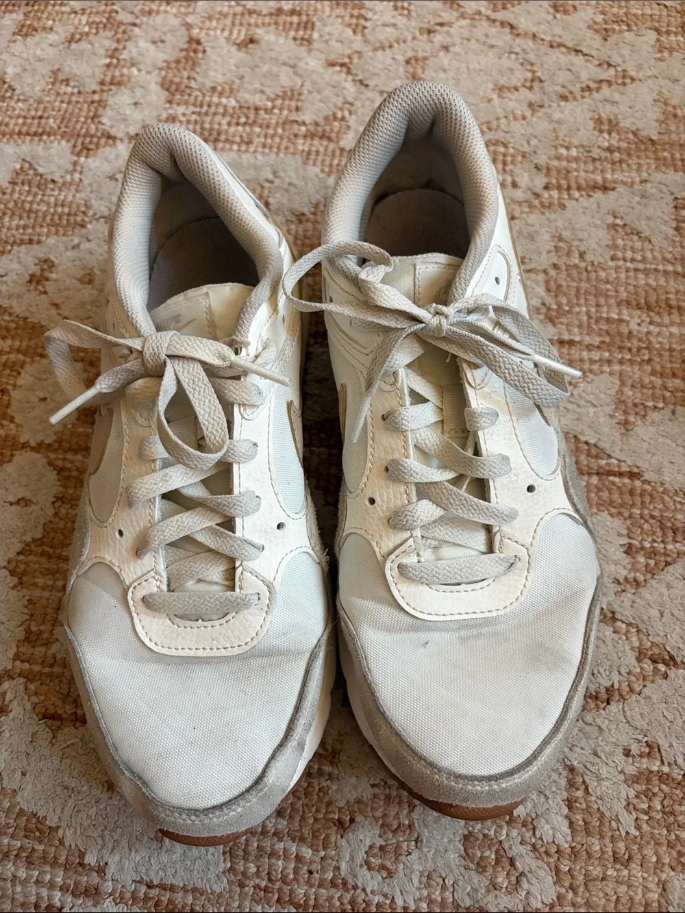 Nike off-white and beige low-top sneakers